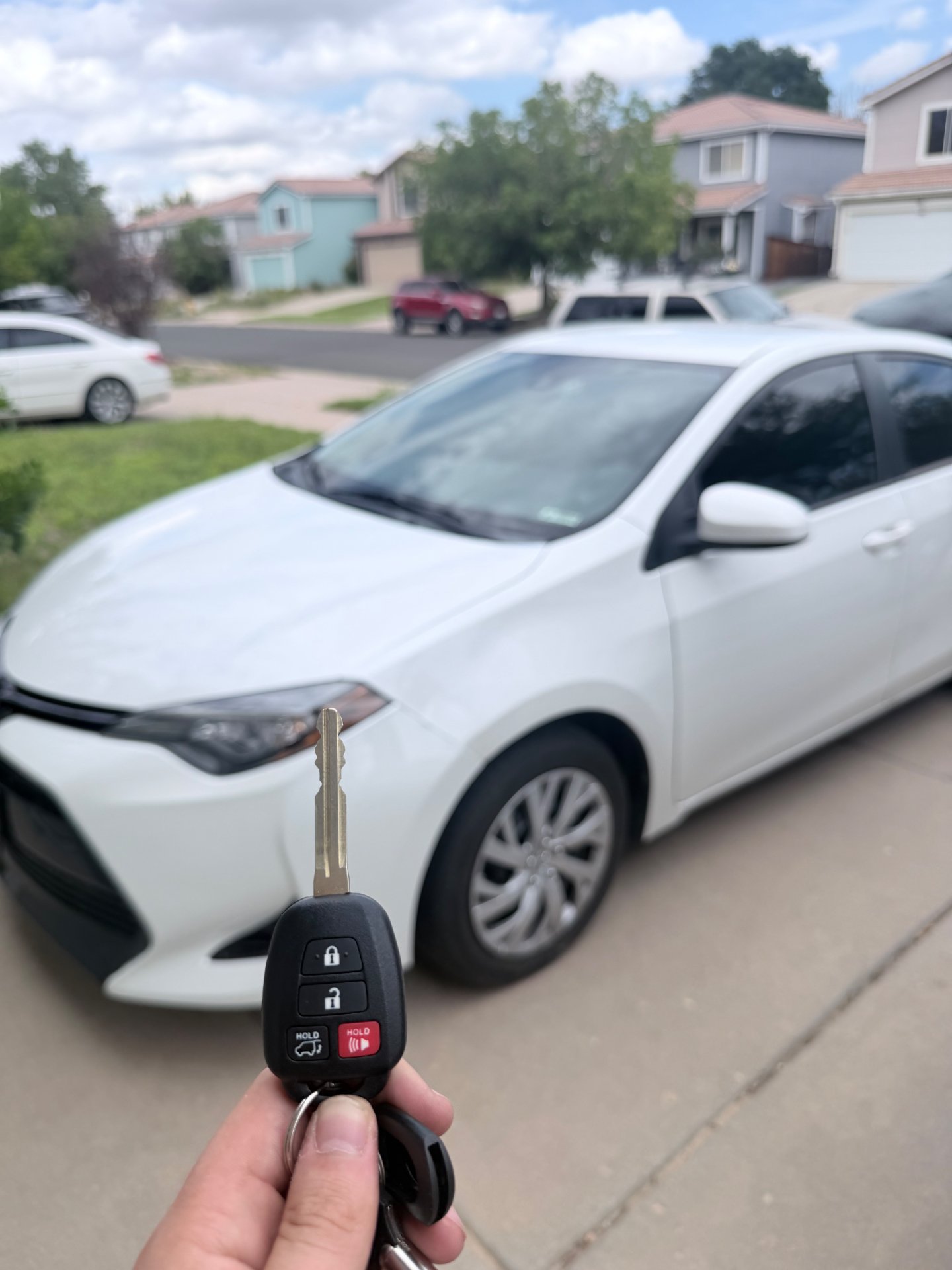 2016 Toyota Corolla replacement key cut and programmed by Falcon Locksmith in Denver Colorado
