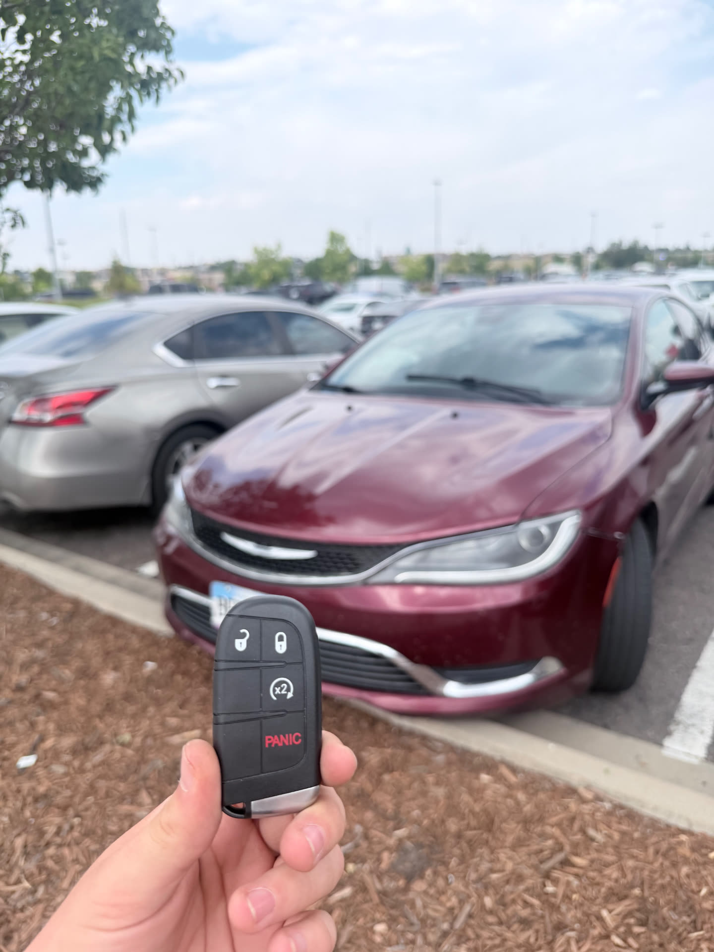 Chrysler 200 replacement smart key programmed by Falcon Locksmith in Denver Colorado